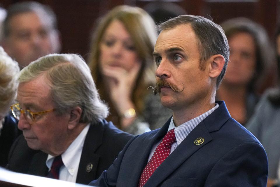 House Impeachment Manager Rep. Andrew Murr listens as Attorney General Ken Paxton is acquitted of all charges in Paxton's impeachment trial at the Texas Capitol on Saturday, Sep. 16, 2023.