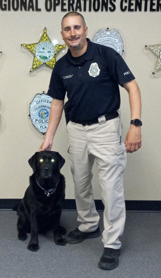 Baxter and his handler, Georgie Torres, an agent with Orlando Regional Operations Center Cybercrime Task Force.