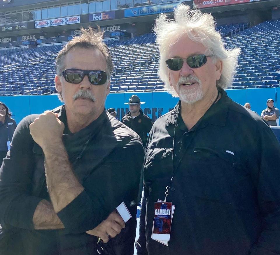 Former Titans coach Jeff Fisher, left, and former Titans defensive coach Dave McGinnis, now the team's color analyst, are on the sideline for Tennessee State game at Nissan Stadium.