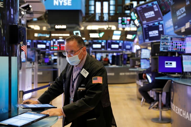 A trader works on the trading floor at the New York Stock Exchange (NYSE) in Manhattan, New York City