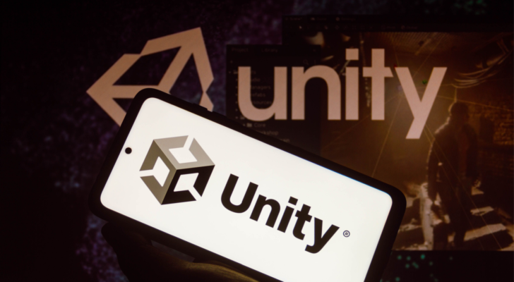 In this photo illustration the Unity Technologies (U) logo seen displayed on a smartphone