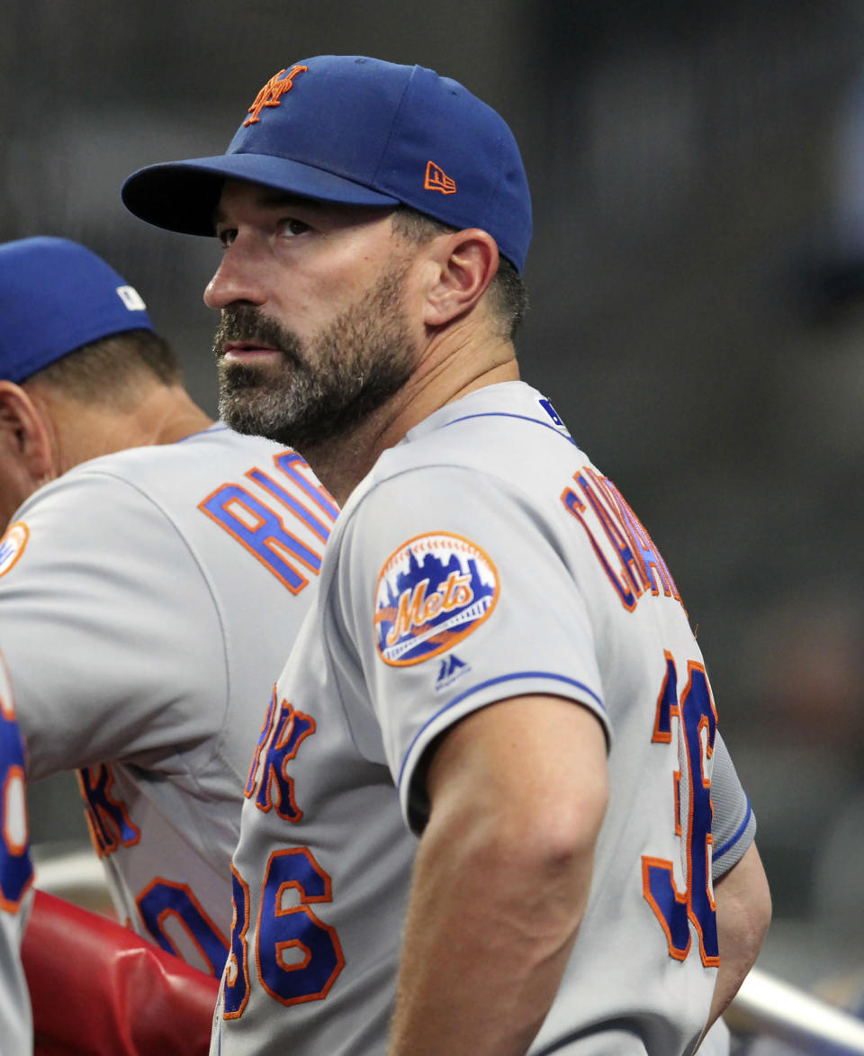 FILE - In this Thursday, Aug. 15, 2019, file photo, then-New York Mets manager Mickey Callaway watches during the eighth inning of a baseball game against the Atlanta Braves, in Atlanta. Callaway, former manager of the New York Mets and current Los Angeles Angels pitching coach, “aggressively pursued” several women who work in sports media and sent three of them inappropriate photos, The Athletic reported Monday, Feb. 1, 2021. (AP Photo/Tami Chappell, File)
