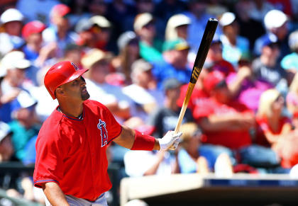 Albert Pujols connects against the Texas Rangers. (USAT)