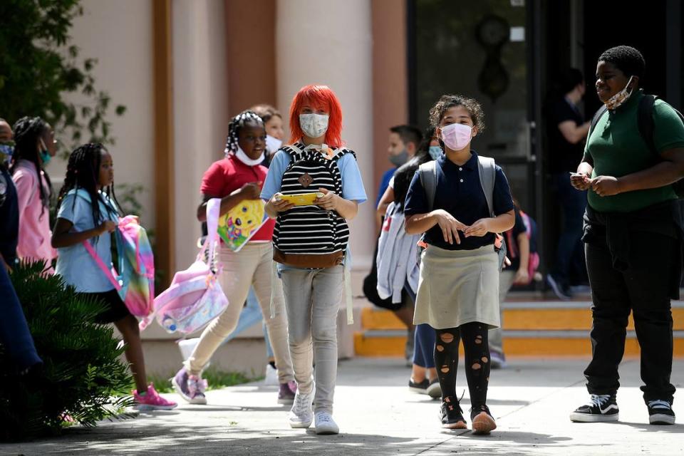 Students are dismissed from Ballard Elementary School on Wednesday, August 25, 2021, in Bradenton. More than 2,400 parents answered a school district survey and said they preferred a mask-only classroom for their children.