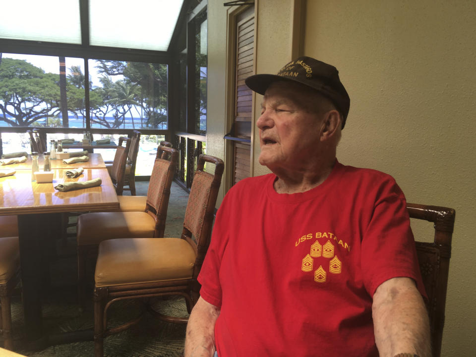 In this Monday, Aug. 13, 2018, photo, Daniel Crowley, a 96-year-old U.S. Army Air Corps veteran from World War II who was held by Japan as a prisoner of war in the Philippines and Japan, speaks during an interview in Honolulu. Crowley is visiting Honolulu to help dedicate a new memorial marker honoring U.S. and Allied prisoners of war killed when U.S. planes bombed a Japanese freighter transporting the POWs. (AP Photo/Audrey McAvoy)