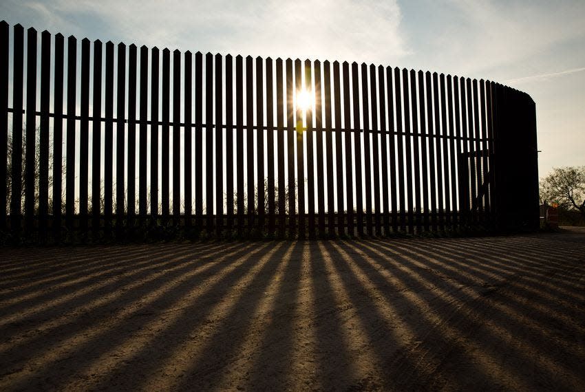 A section of the border fence along the Rio Grande in South Texas was built under George W. Bush's administration.