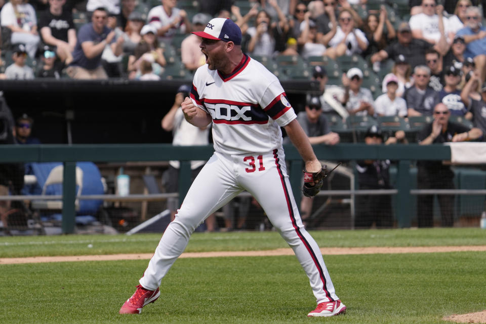 Liam Hendriks reacts after an inning-ending strikeout of Tyler Nevin.  (AP photo/Nam Y. Huh)