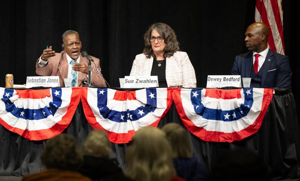 Modesto mayoral candidate Sebastian Jones, left, Modesto mayor Sue Zwhalen, and challenger Dewey Bedford, right, discuss city issues during a NAACP 2024 candidates forum at Modesto Centre Plaza in Modesto, Calif., Thursday, Feb. 22, 2024.