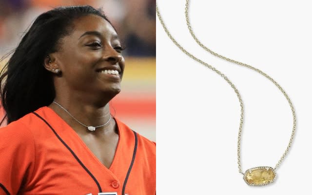 Simone Biles throws out the ceremonial first pitch prior to Game Two of the 2019 World Series, Mike Ehrmann/Getty Images/ Kendra Scott.