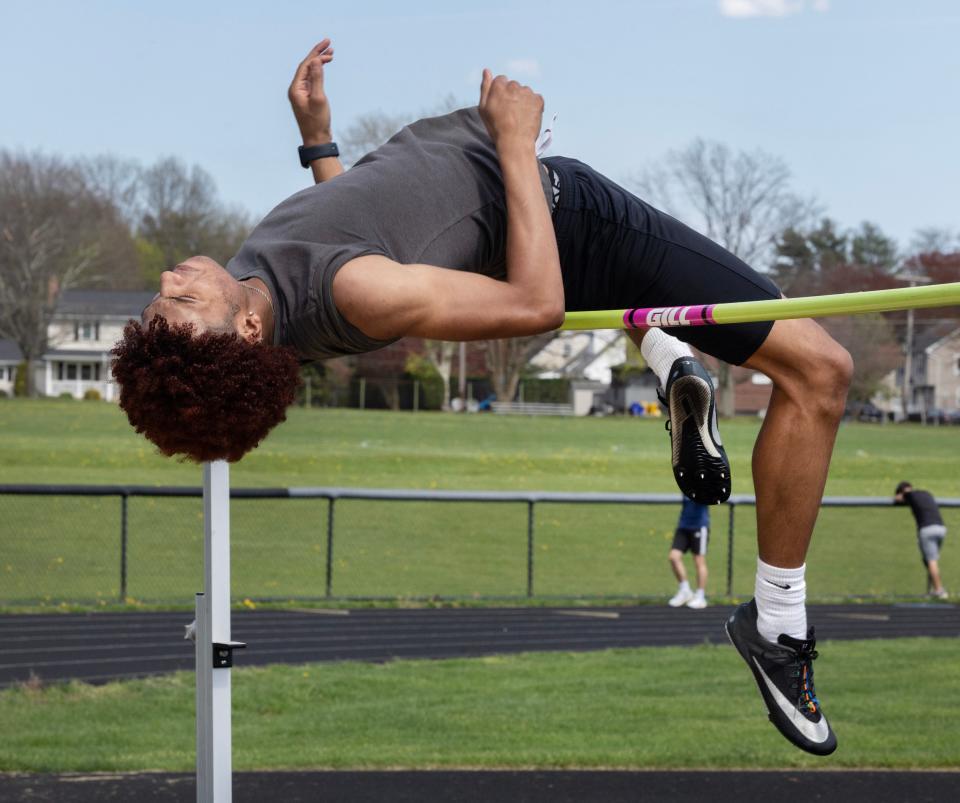 Freehold Boro track standout Malakai Pressey works on his form during recent after school workout. Pressey was the state indoor track champion in the high jump