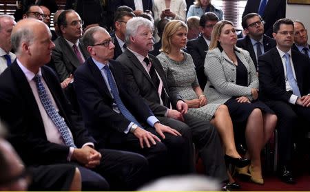 Members of the audience listen as Britain's Home Secretary Theresa May speaks at a press conference in London, Britain, June 30, 2016. REUTERS/Dylan Martinez