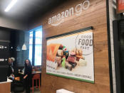 Signage is seen inside Amazon’s first cash register-free grocery store, in Seattle, Washington, U.S., January 18, 2018. Photo taken January 18, 2018. REUTERS/Jeffrey Dastin