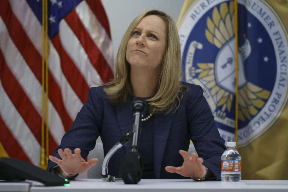 New Bureau of Consumer Financial Protection Director Kathy Kraninger pauses as she speaks to media at the Bureau of Consumer Financial Protection offices in Washington, Tuesday, Dec. 11, 2018. (AP Photo/Carolyn Kaster)