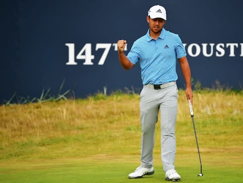 Xander Schauffele of the United States celebrates a birdie on the 18th hole during the third round of the 147th Open Championship at Carnoustie Golf Club - Credit: Stuart Franklin/Getty Images