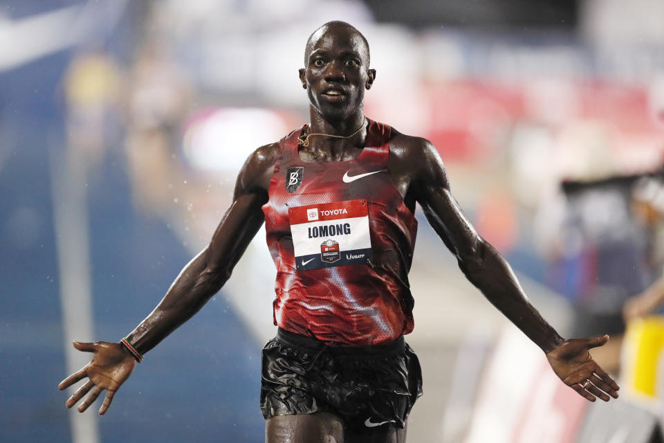 Lopez Lomong reacts as he wins the men's 10,000-meter run at the U.S. Championships athletics meet, Thursday, July 25, 2019, in Des Moines, Iowa. (AP Photo/Charlie Neibergall)