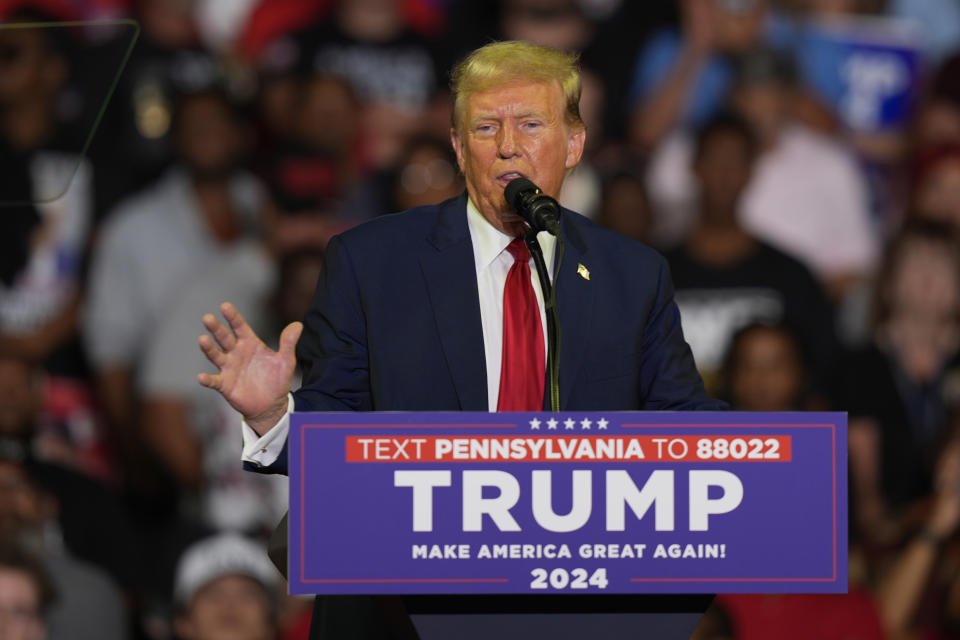 FILE - Republican presidential candidate former President Donald Trump speaks at a campaign rally, June 22, 2024, in Philadelphia. Trump is seeking to distance himself from a plan for a massive overhaul of the federal government drafted by some of his administration officials. Some of these men are expected to take high-level roles if the Republican presumptive nominee is elected back into the White House. Trump is saying on Truth Social that he 