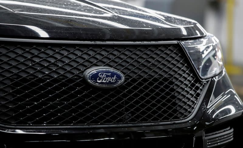 FILE PHOTO: The logo of Ford is seen on a 2020 Ford Explorer car at Ford's Chicago Assembly Plant in Chicago