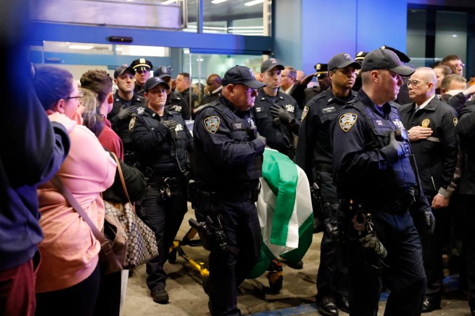 More NYPD presence can be seen as they honor fellow officer Jonathan Diller. Kevin C. Downs for NY Post