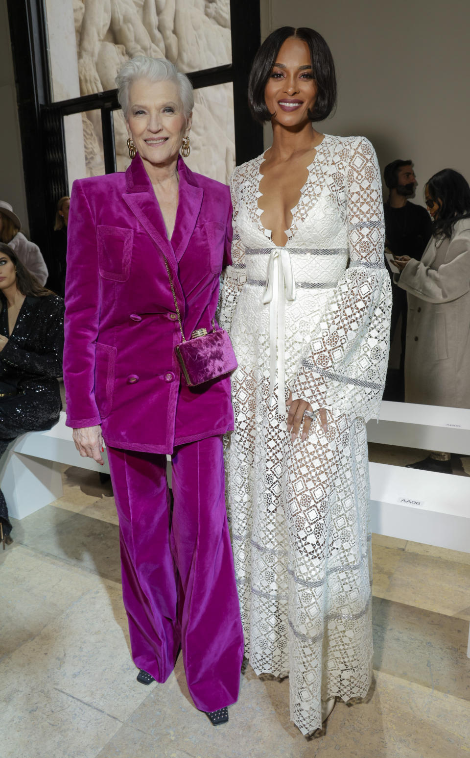 Maye Musk, left, and Ciara pose for photographers at the Elie Saab Fall/Winter 2023-2024 ready-to-wear collection presented Saturday, March 4, 2023 in Paris. (Vianney Le Caer/Invision/AP)