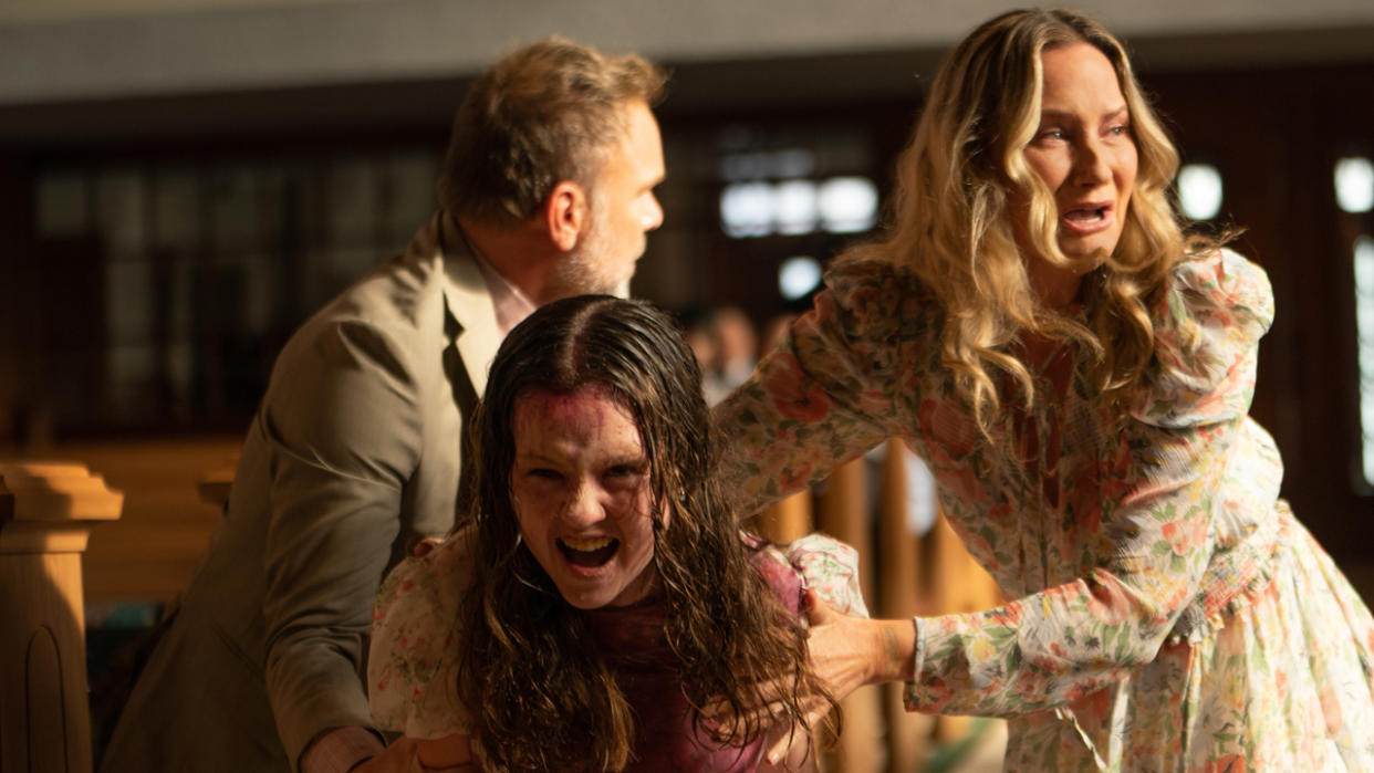  Tony (Norbert Leo Butz), Katherine (Olivia O’Neill) and Miranda (Jennifer Nettles) in The Exorcist: Believer. 