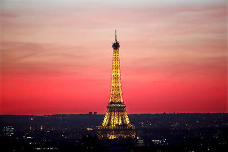 The Eiffel Tower is seen at sunset in Paris, France, November 9, 2015. REUTERS/Charles Platiau/File Photo