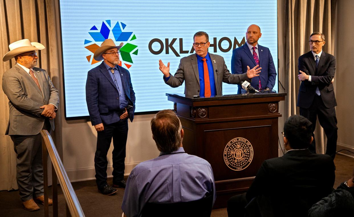 Kevin McDugle, R-Broken Arrow, center, speaks during a press conference to discuss updates regarding the case of death row inmate Richard Glossip at the State Capitol in Oklahoma City, Okla. on Tuesday, Feb. 22, 2022. 