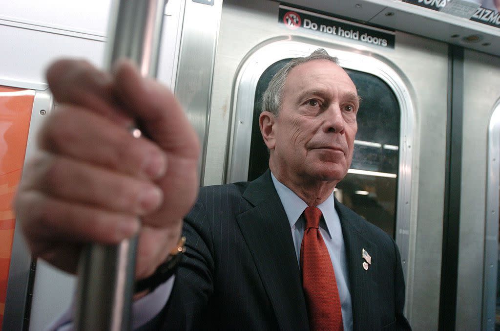 New York City Mayor Michael Bloomberg (C) rides the subway downtown to New York City Hall October 7, 2005 in New York City.