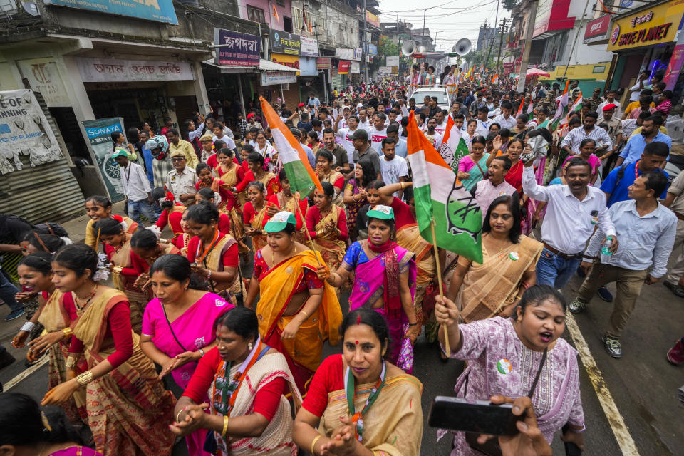 Women supporters of the Congress party campaign for the upcoming national elections in Titabor in upper Assam, India, Tuesday, April 16, 2024. (AP Photo/Anupam Nath)