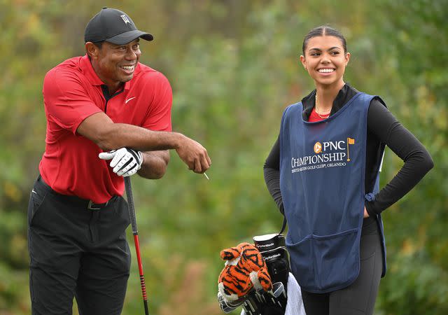 <p>Ben Jared/PGA TOUR/Getty</p> Tiger Woods and Sam Woods on the 10th tee box during the final round of the PNC Championship at Ritz-Carlton Golf Club on December 17, 2023 in Orlando, Florida.