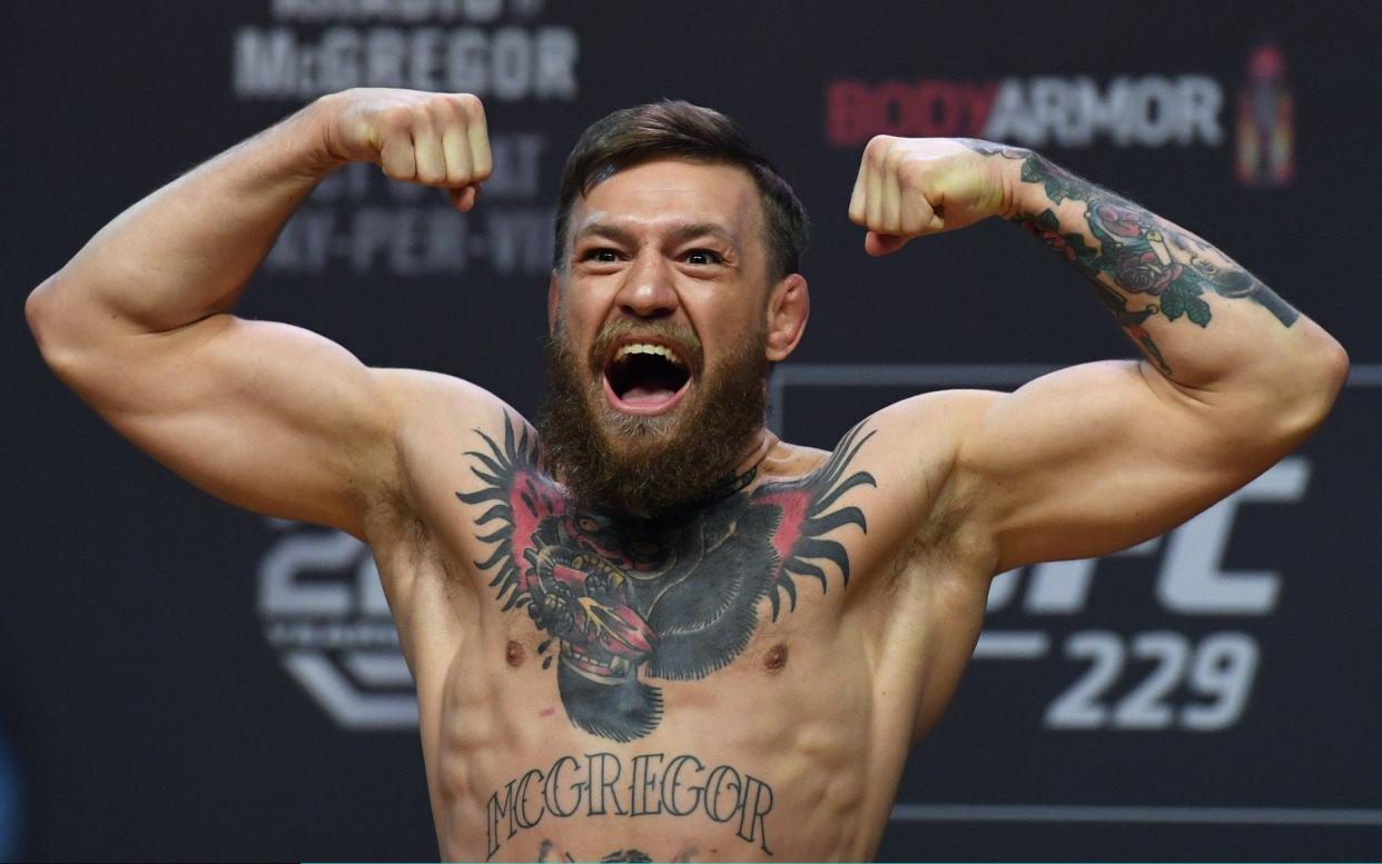 Conor McGregor poses during a ceremonial weigh-in for UFC 229 in 2018 - Getty