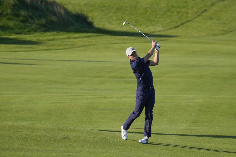 Team USA's Justin Thomas hits on the fifth hole during a foursome match the Ryder Cup at the Whistling Straits Golf Course Friday, Sept. 24, 2021, in Sheboygan, Wis. (AP Photo/Ashley Landis)