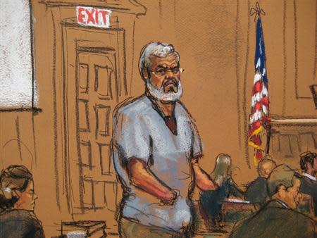 Abu Hamza al-Masri, the radical Islamist cleric facing U.S. terrorism charges, stands with his legal team in Manhattan federal court in New York in this artist's sketch, April 14, 2014. REUTERS/Jane Rosenberg