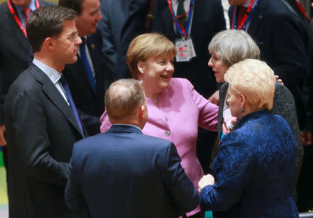 Netherlands Prime Minister Mark Rutte, Denmark's Prime Minister Lars Lokke Rasmussen, Germany's Chancellor Angela Merkel, British Prime Minister Theresa May and Lithuania's President Dalia Grybauskaite attend a meeting during a European Union summit in Brussels, Belgium, March 9, 2017. REUTERS/Olivier Hoslet/Pool