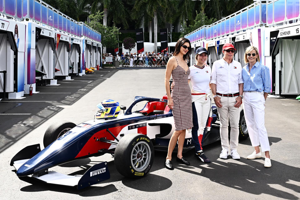 MIAMI, FLORIDA - MAY 03: Kendall Jenner, Nerea Marti of Spain and Campos Racing, Tommy Hilfiger and Susie Wolff, Managing Director of F1 Academy, pose for a photo in the Paddock after practice prior to Round 2 Miami of the F1 Academy at Miami International Autodrome on May 03, 2024 in Miami, Florida. (Photo by Pauline Ballet - Formula 1/Formula 1 via Getty Images)
