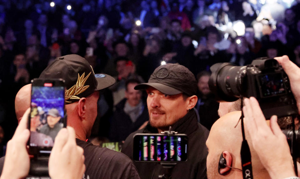 LONDON, ENGLAND - DECEMBER 03: Tyson Fury interacts with Oleksandr Usyk after the WBC World Heavyweight Title fight between Tyson Fury and Derek Chisora at Tottenham Hotspur Stadium on December 03, 2022 in London, England. (Photo by Warren Little/Getty Images)