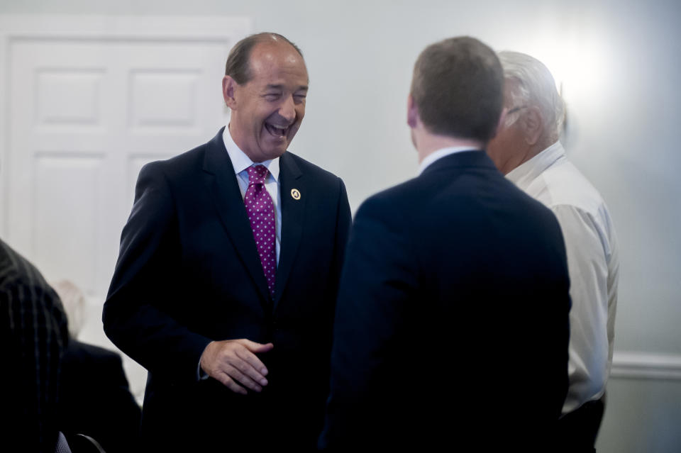 Minority floor leader and gubernatorial candidate Rep. Rocky Adkins. center, D-Sandy Hook, talks with people Wednesday, May 1, 2019, at the Bowling Green Rotary Club in Bowling Green, Ky. (Bac Totrong/Daily News via AP)