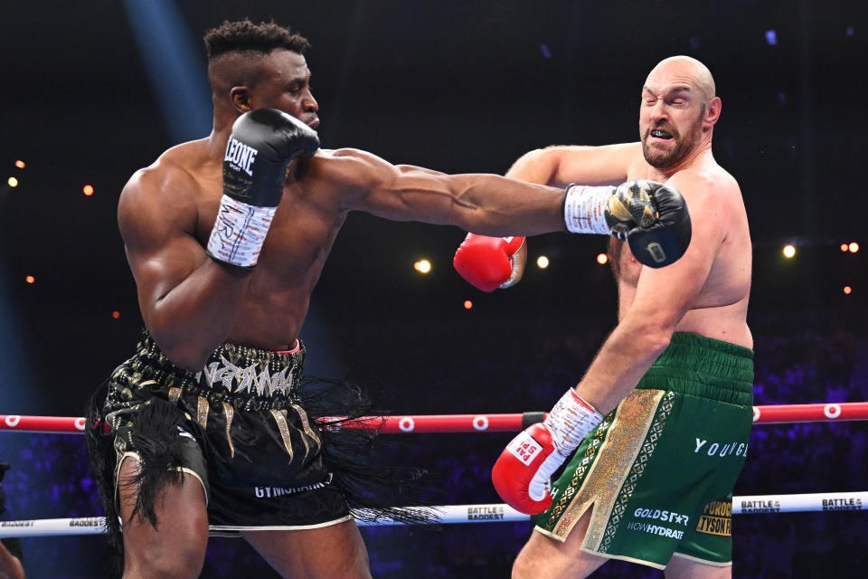 Francis Ngannou punches Tyson Fury during their heavyweight fight on Oct. 28. (Justin Setterfield/Getty Images)