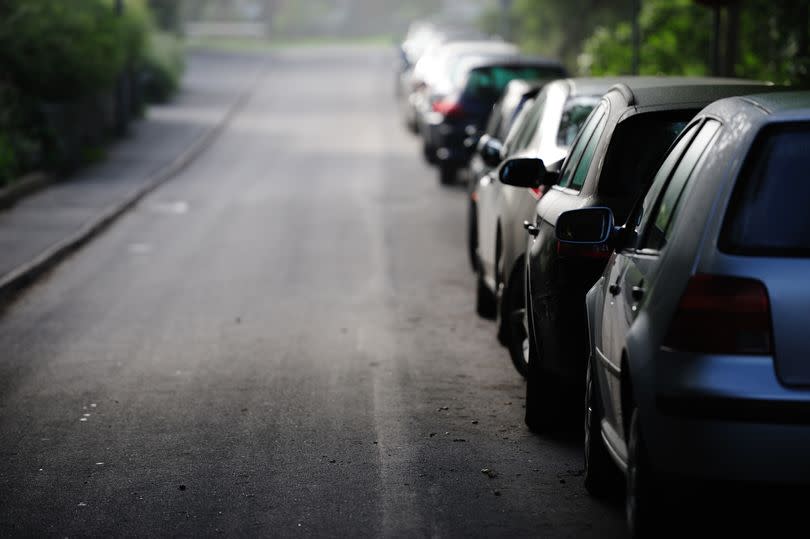 Street parking in twilight.