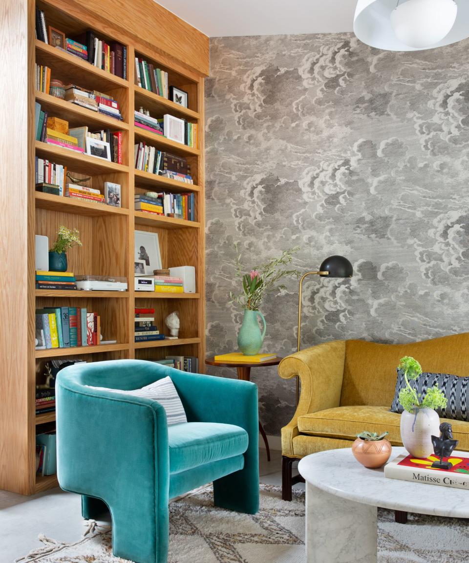 A book shelf filled with stacked books