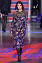 <p>Bella followed her big sis down the runway during the Tommy Hilfiger show in a sheer floral dress.</p>