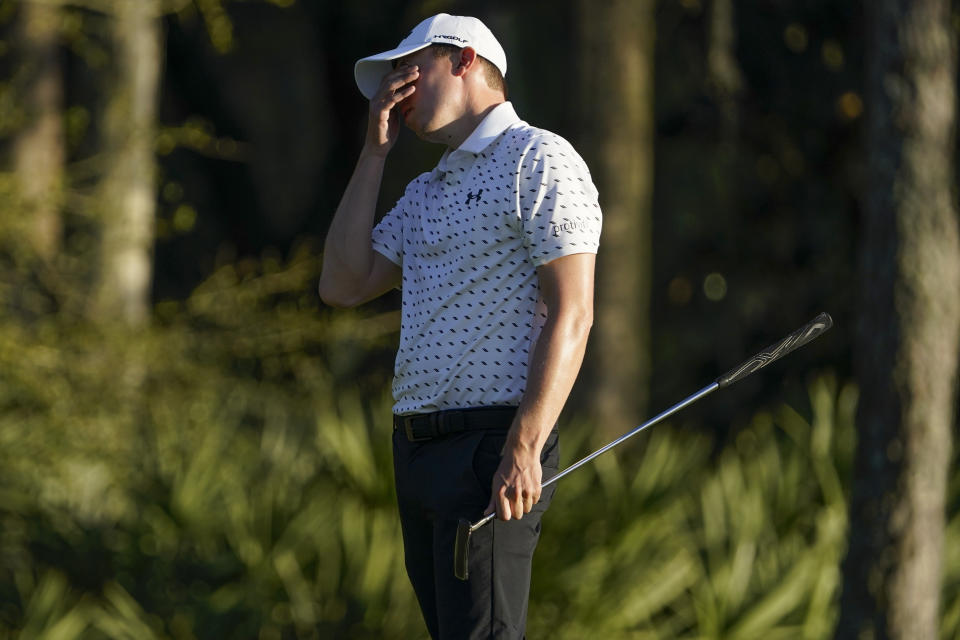 Matthew Fitzpatrick of England, reacts after missing a putt on the seventh hole during the second round of the The Players Championship golf tournament Friday, March 12, 2021, in Ponte Vedra Beach, Fla. (AP Photo/John Raoux)