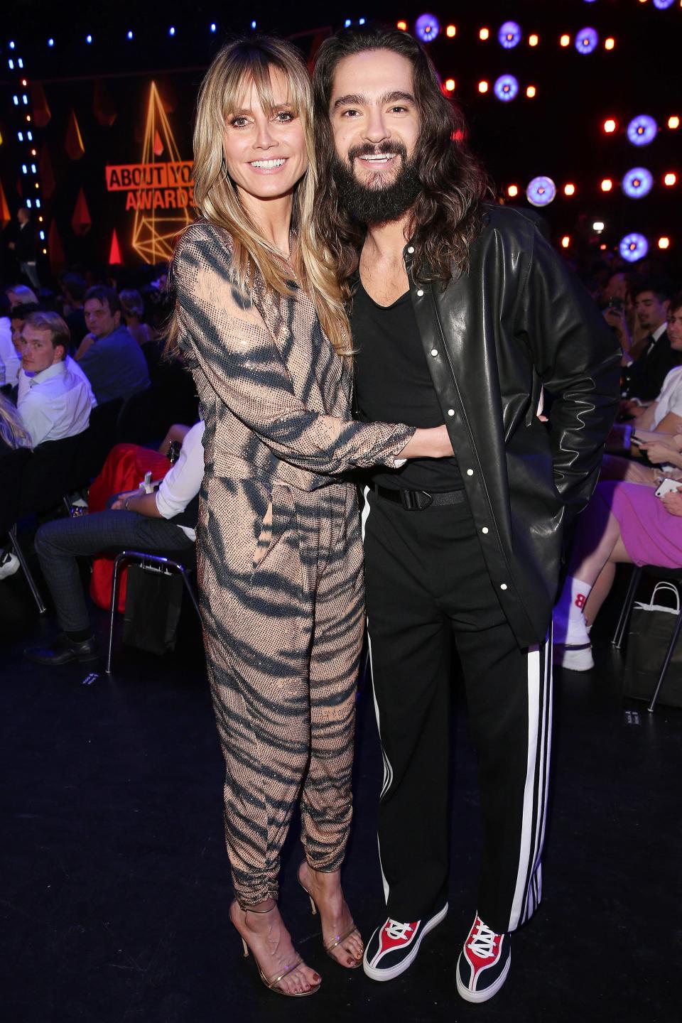 Heidi Klum and fiancé Tom Kaulitz cozy up at the 3rd About You Awards on Thursday in Munich, Germany.