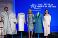 First lady Jill Biden, center, is joined by designers Gabriela Hearst, left, and Alexandra O'Neill, at an event to present her 2021 inaugural ensembles to the Smithsonian's National Museum of American History, Wednesday, Jan. 25, 2023, in Washington. (AP Photo/Alex Brandon)