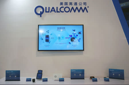 A booth of U.S. chipmaker Qualcomm is pictured at an expo in Beijing, China, September 27, 2017. Picture taken September 27, 2017. REUTERS/Stringer