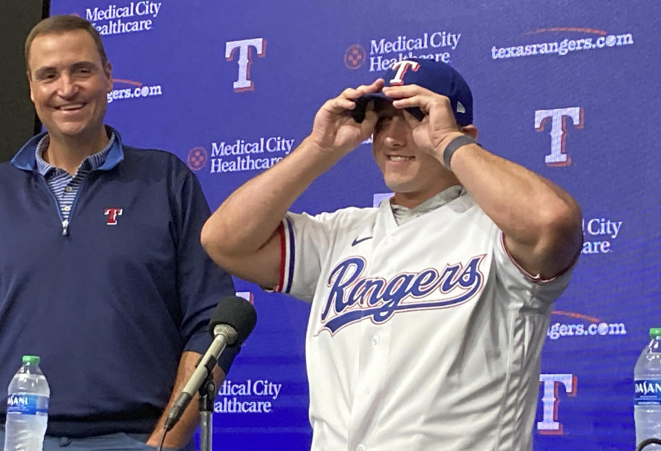 Wyatt Langford, the Florida outfielder the Texas Rangers drafted fourth overall on July 9, is introduced Tuesday at Globe Life Field in Arlington, Texas. Langford's $8 million signing bonus is the largest ever for a player drafted by the Rangers. (AP Photo/Stephen Hawkins)