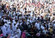 Muslim pilgrims wear protective face masks to prevent contracting coronavirus, as they pray at the Grand mosque in the holy city of Mecca