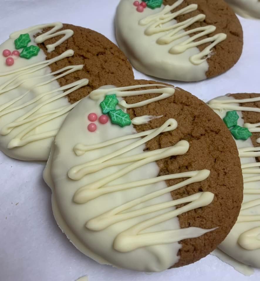 Heather Palmer, owner of Better When Baked, was busy filling cookie orders during the holiday season. Her specialty is gingersnap cookies dipped in white chocolate with tiny holiday embellishments. 
Dec. 2021.