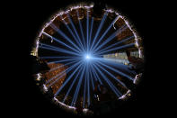 <p>People stand and inside the art installation of The Tribute in Light on Sept. 11, 2017. (Gordon Donovan/Yahoo News) </p>