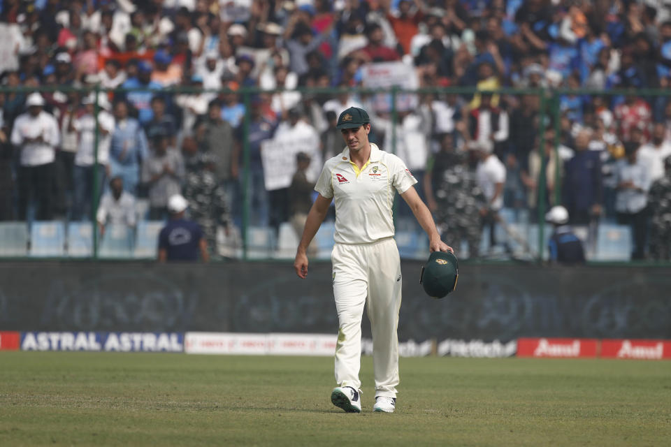 Pat Cummins (pictured) reacts after the loss against India.