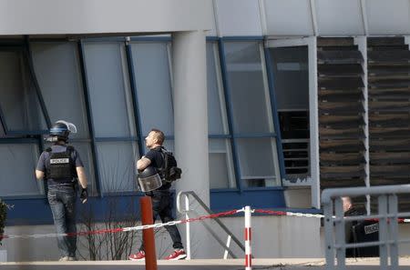 Police inside the Tocqueville high school after a shooting in Grasse, southern France, March 16, 2017. REUTERS/Eric Gaillard